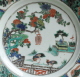 A richly-decorated Chinese famille verte plate, Kangxi
