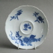 A Chinese export soft paste chocolate cup with trembleuse saucer, Qianlong