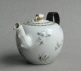 A Chinese export teapot wth grisaille decoration, and copying a Meissen shape, Qianlong