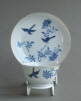 An attractive Chinese teabowl and sacuer decorated wth overglaze blue enamel, Yongzheng or early Qianlong