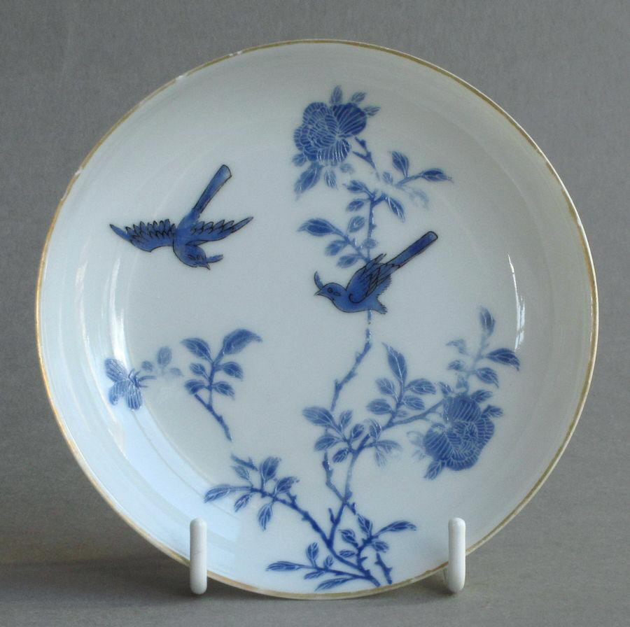 An attractive Chinese teabowl and sacuer decorated wth overglaze blue enamel, Yongzheng or early Qianlong