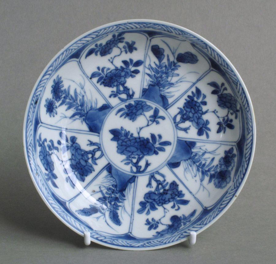 Two finely-potted Chinese saucers with underglaze blue decoration, and dating from the Kangxi period