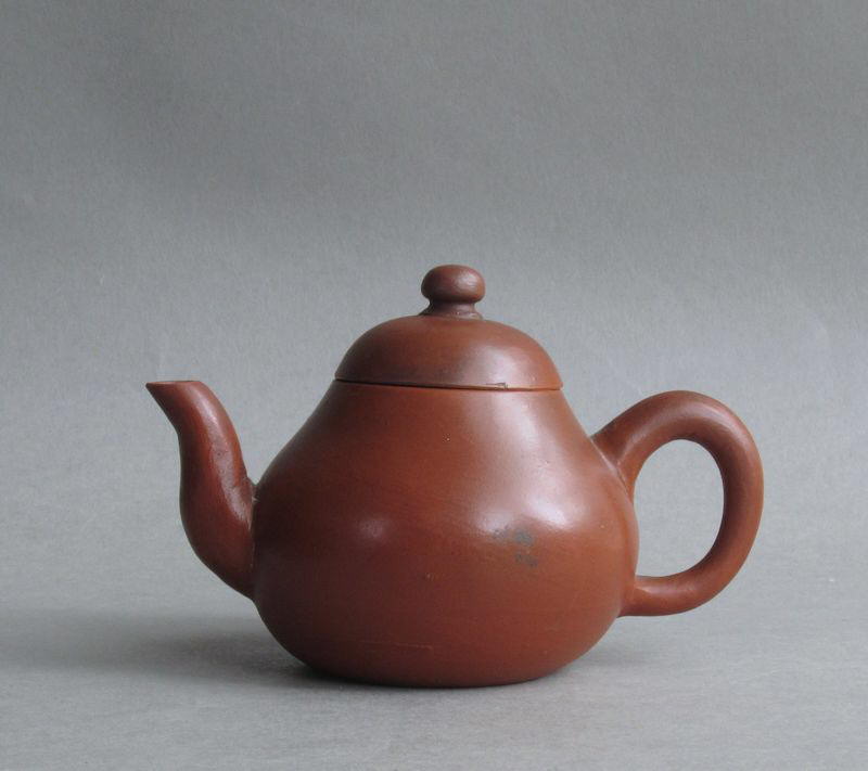 An attractive Chinese Yixing pear-shaped teapot, Nineteenth Century