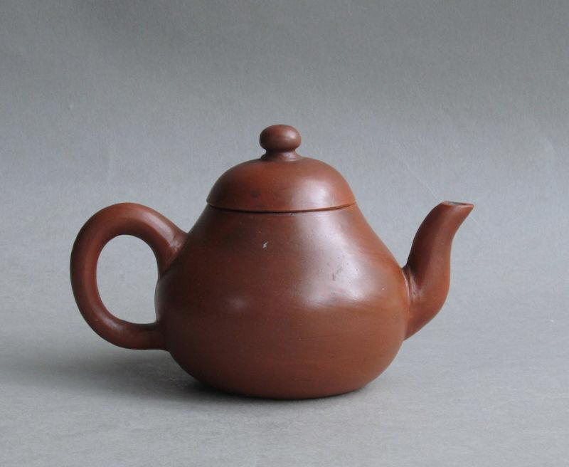 An attractive Chinese Yixing pear-shaped teapot, Nineteenth Century